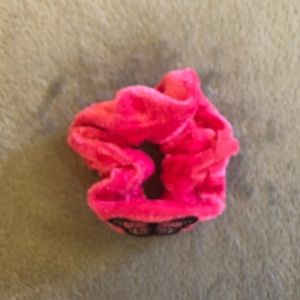 Bright pink scrunchie with a butterfly